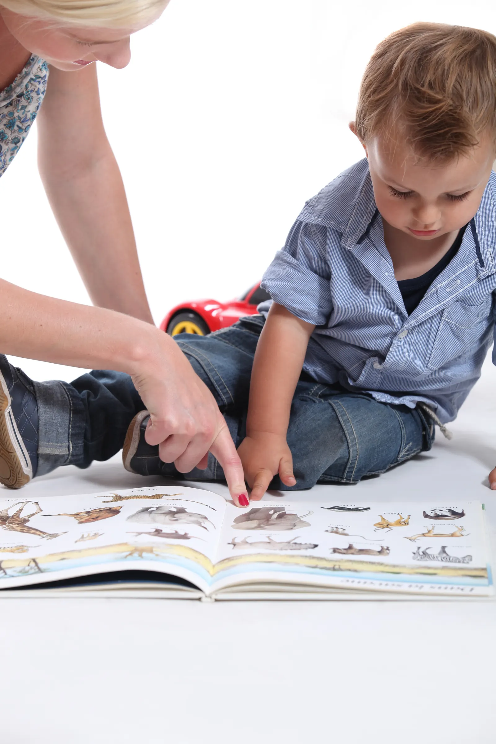 Mother,And,Child,Looking,At,A,Book at Bethany Academy